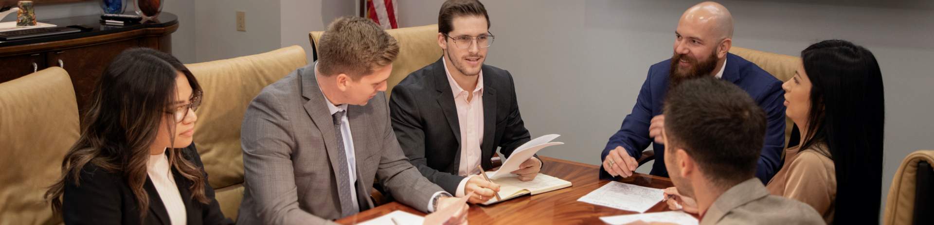 A group of attorneys in a discussion